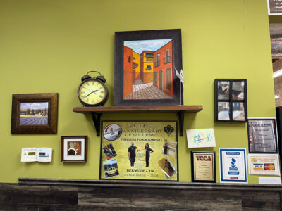 Timeless floor Company 20th anniversary card framed on the wall in our showroom.