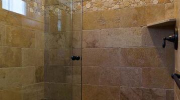 porcelain and ceramic tiles in a shower.