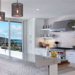 kitchen with adella viso gris satin tile.