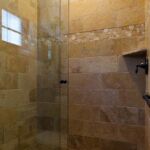 porcelain and ceramic tiles in a shower.