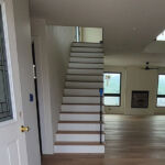 entryway, living room, stairway.