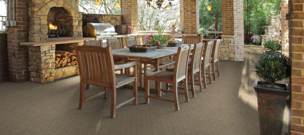 carpet in indoor and outdoor dining space.