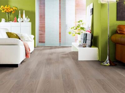 grey laminate flooring in living room.